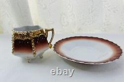 Vintage/antique Unbranded Tea Cup & Saucer Of High Gold Floral Relief 1760